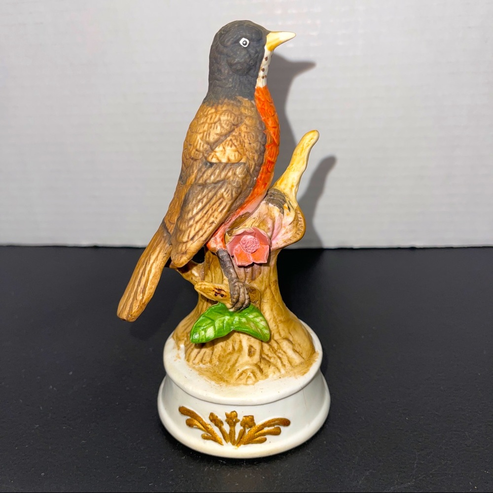 Vintage Mann Robin on a branch musical figurine